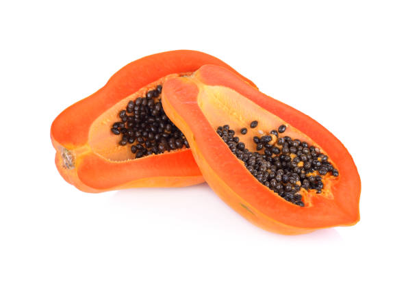 istock half cut ripe papaya with seed on white background 672806036