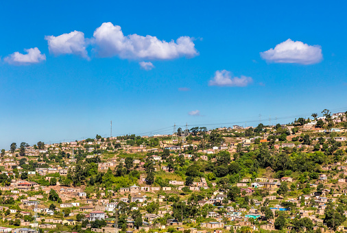 Homes built along the mountain side near Durban in Kwazulu-Natal countryside.