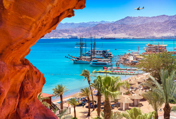 Marina and central public beach of Eilat Eilat is a very popular tropical getaway for Israeli and European tourists akaba stock pictures, royalty-free photos & images