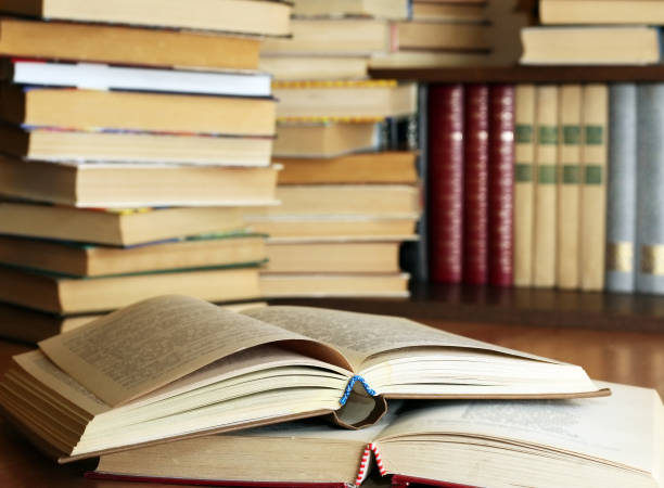 istock Many old books combined by a heap 672816442