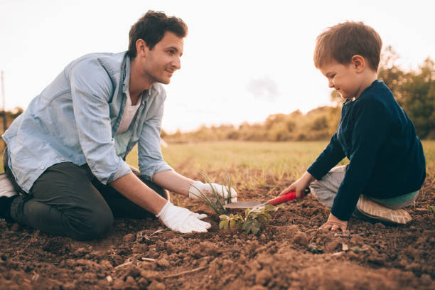 istock Gardening with my father 672823128