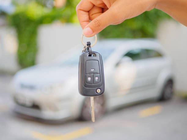 istock hand presses on the remote control car alarm systems 672824018