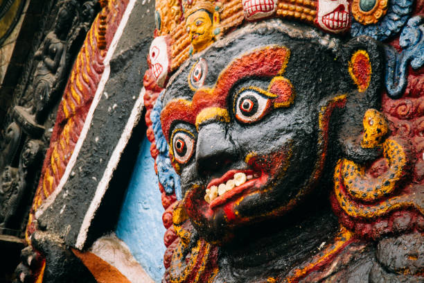 Closeup of the terrifyingly portrayed Bhairav in Durbar Square, Kathmandu. stock photo
