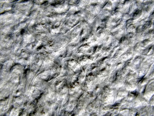 istock Texture of a surface of silk plaster closeup 672824520