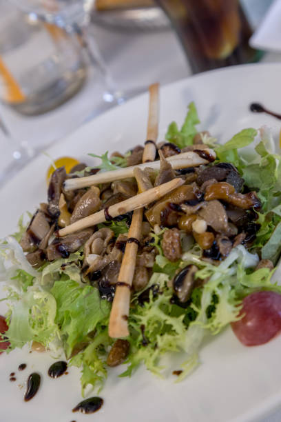 istock Salad with mushroom in the restaurant 672828440