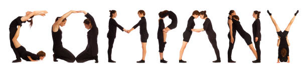 istock Black dressed people forming word COMPANY 672832040