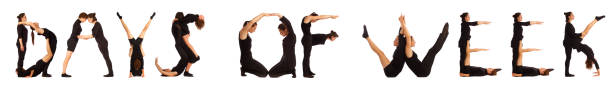 istock Black dressed people forming word DAYS OF WEEK 672836806