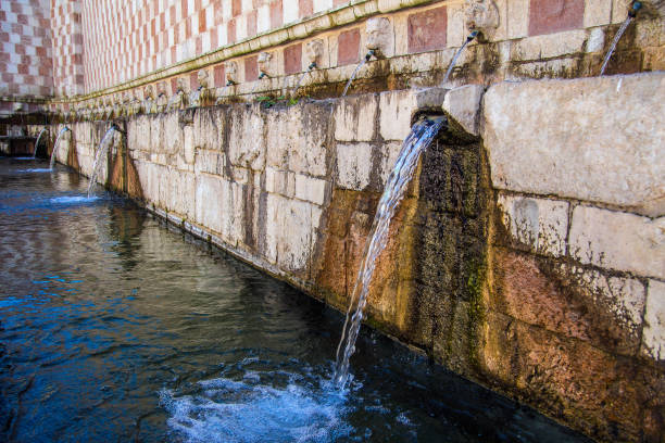 istock Fountain of the 99 Spouts, L'Aquila 672837496
