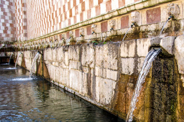 istock Fountain of the 99 Spouts, L'Aquila 672837586