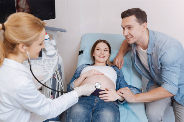 istock Future young father supporting pregnant wife in the hospital 672837708