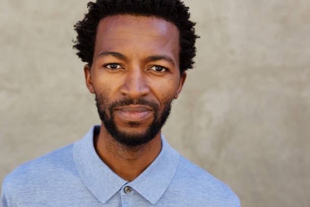 istock Close up serious african american man staring 672845954