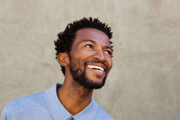 istock Close up cheerful african american man laughing 672845994