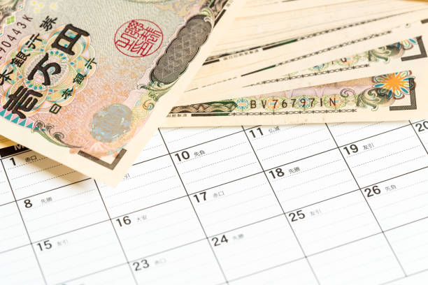 Calender and money Calender and money. byte photos stock pictures, royalty-free photos & images