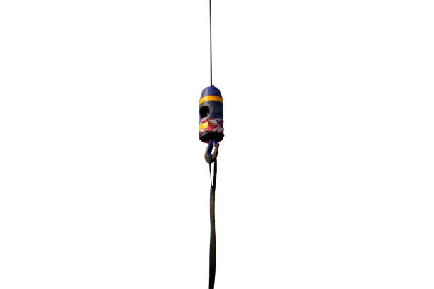 istock Crane Hook isolated on white . crane hook carrying a larger load . 672880044