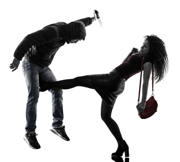 istock woman thief aggression self defense isolated 672880336