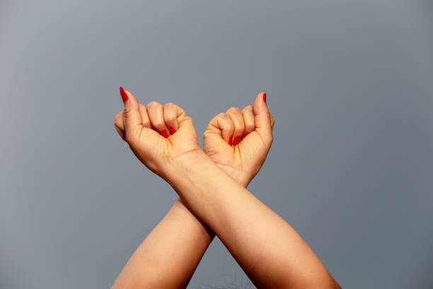 istock Female hand crossed 672891112