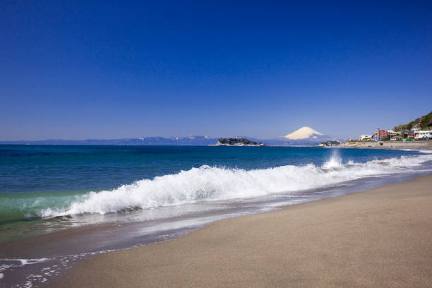 Waves and Mt. Fuji Waves and Mt. Fuji shonan photos stock pictures, royalty-free photos & images