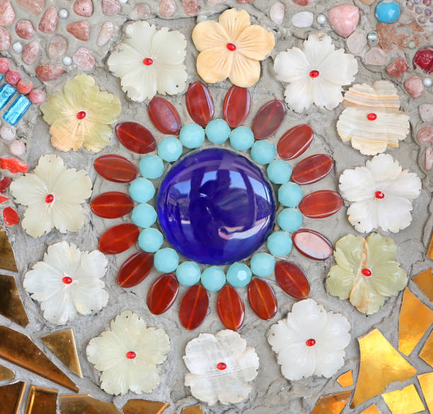 istock Colorful ceramic pattern decoration with pebbles made from pebble and ceramic on the wall. 672898044