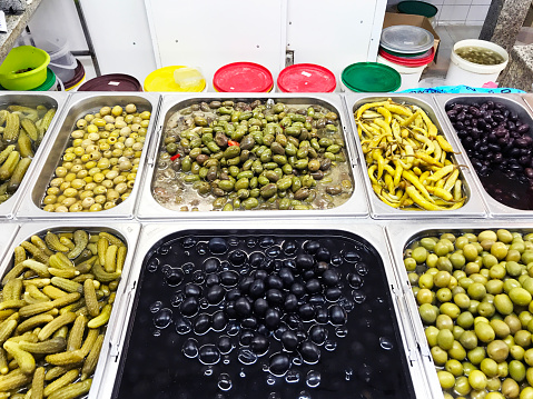 Different kinds of olives, pickles and others.
