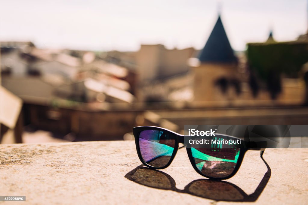 Sunglasses in summer Some sunglasses in a travel spot Arts Culture and Entertainment Stock Photo