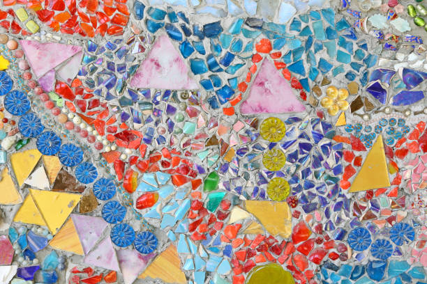 istock Colorful ceramic pattern background made from pebble and ceramic on the wall. 672909518