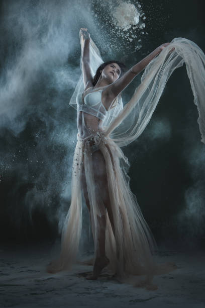 istock Woman is dancing in flour. 672920118
