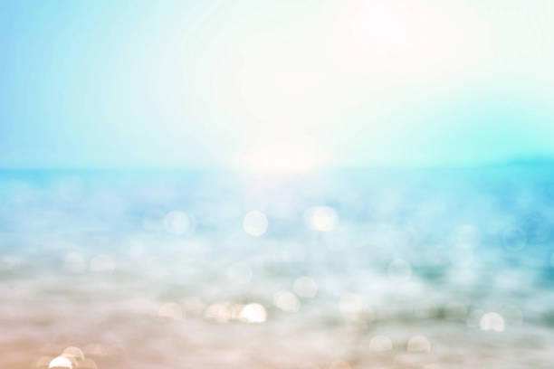 istock Blur beautiful shiny sparkling  tropical blue sea beach 672920372