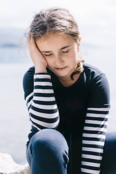istock Young girl sleeps 672933518