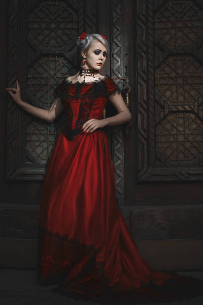 istock Woman in a ball gown with lace. 672934126