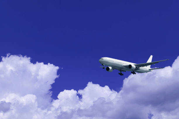 istock Aircraft and towering cloud in summer 672940792