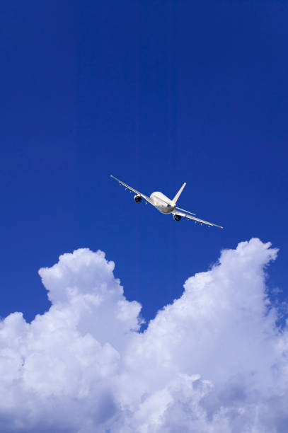istock Aircraft and towering cloud in summer 672941054