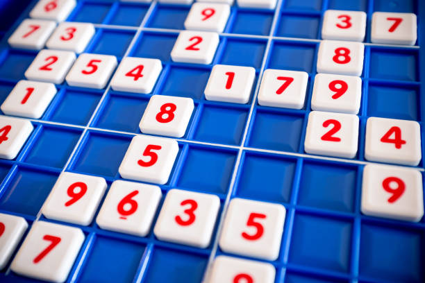 istock Number puzzle on wood background 672941680