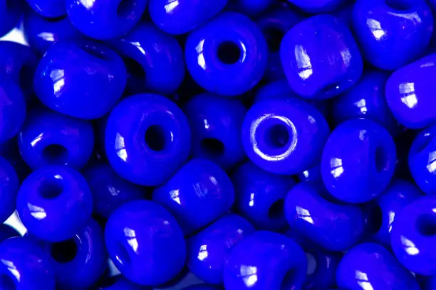Lot of blue beads for decoration and handcraft, close-up