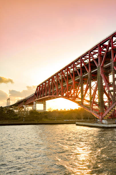 istock Sunset at the Minato Bridge (red bridge) in Osaka 672950926