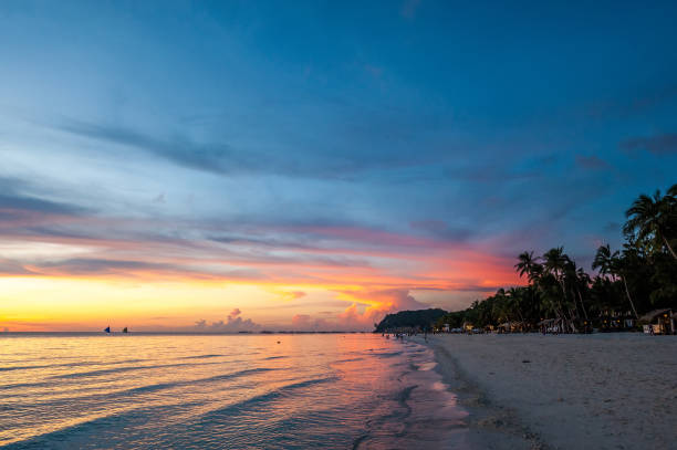 istock Beautiful sunset at Boracay beach, Philippines 672957618