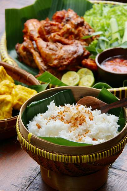 istock Steamed Rice for Indonesian Char-grilled Chicken with Javanese Spices 672958654