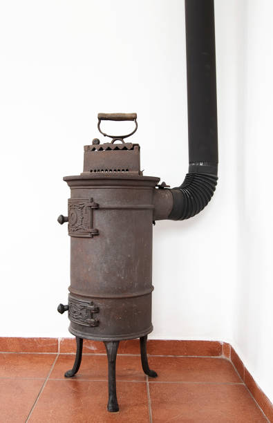 Vintage house cooking stove in a kitchen. Rusty stove