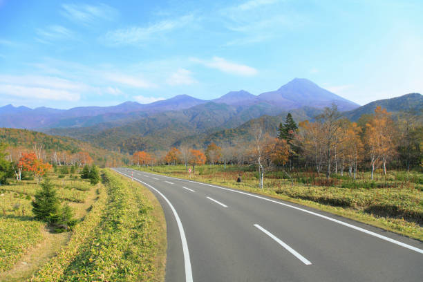 istock Shiretoko mountain range and the way 672973022