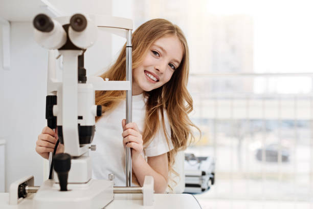 istock Cute pretty lady wanting her eyes checked 672979066