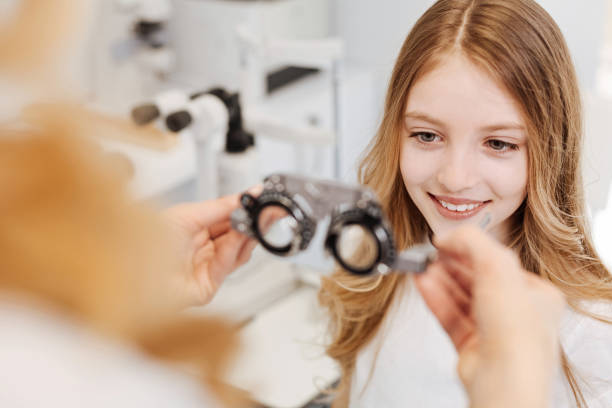 istock Excited bright girl getting glasses 672982200
