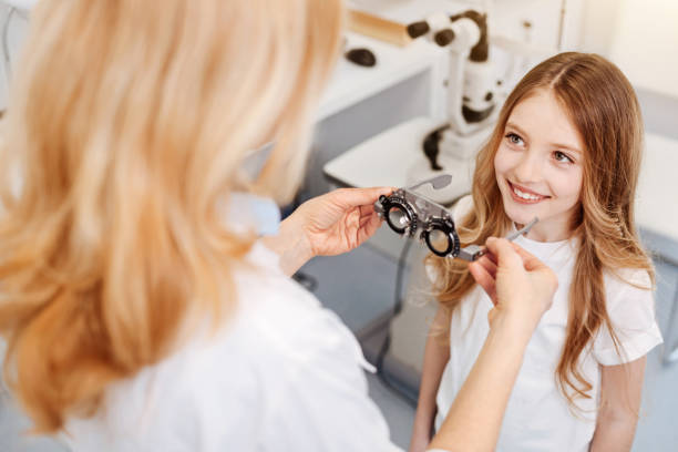 istock Thoughtful wise doctor offering trial spectacles 672982572