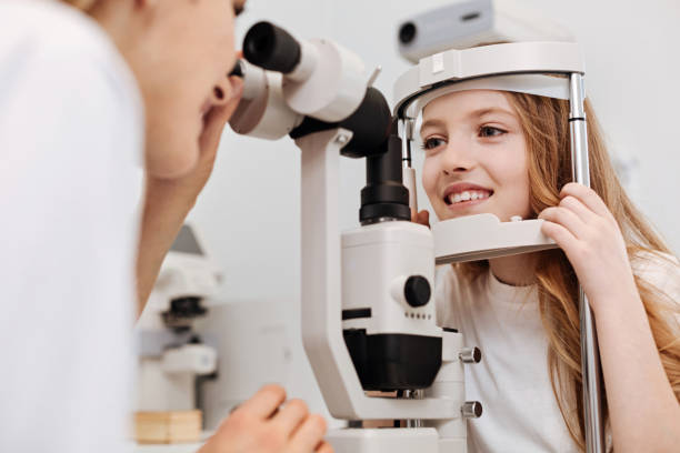 istock Innovative clever ophthalmologist employing professional tools 672983752