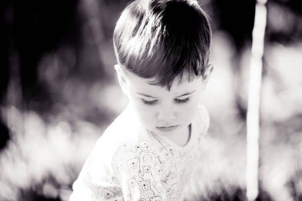 istock Black and white child portrait 672988398