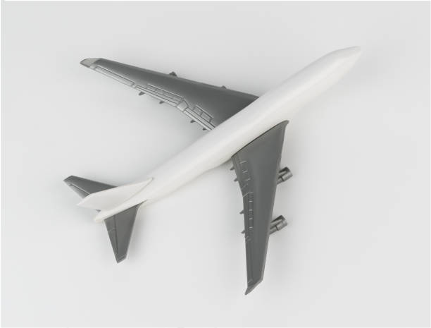 istock White plastic plane toy isolated on white background 672993274