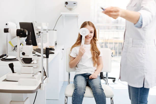 istock Motivated admirable girl doing a test 673003964