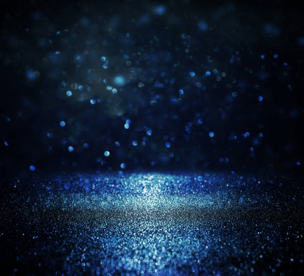 istock glitter vintage lights background. defocused 673007738