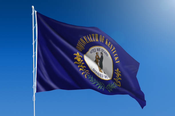 US state flag of Kentucky The flag of the state of Kentucky blowing in the wind in front of a clear blue sky us state flag stock pictures, royalty-free photos & images