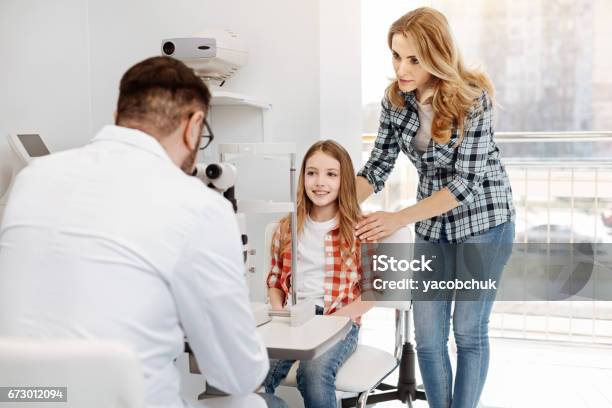 Young Admirable Teenager Receiving Doctors Advice Stock Photo - Download Image Now - Helicopter, Teenager, Medical Clinic