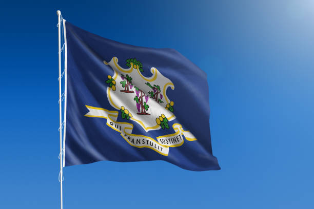 US state flag of Connecticut The flag of the state of Connecticut blowing in the wind in front of a clear blue sky us state flag stock pictures, royalty-free photos & images