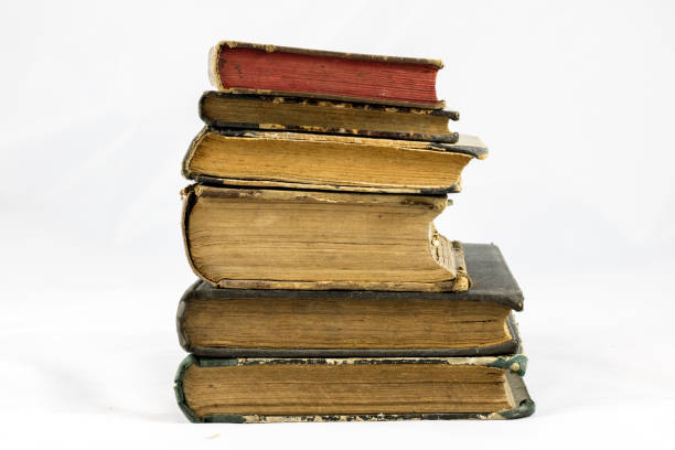 istock Old dusty book on white isolated background 673016974